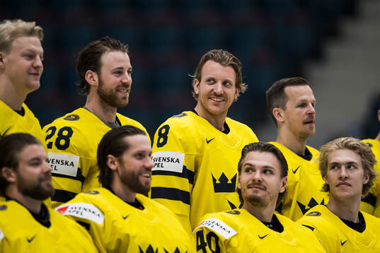 Elias Lindholm, Jonas Brodin, Max Friberg, goalkeeper Samuel Ersson, goaltender Jacob Markström and goaltender Arvid Söderblom of Sweden at the official team photo shoot