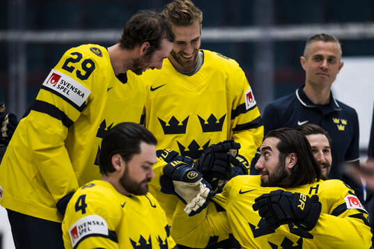Marcus Pettersson, Alexander Wennberg and Mika Zibanejad of Sweden at the official team photo shoot