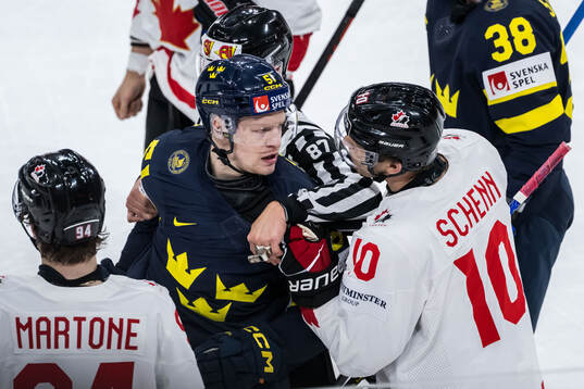Emil Heineman of Sweden and Brayden Schenn of Canada
