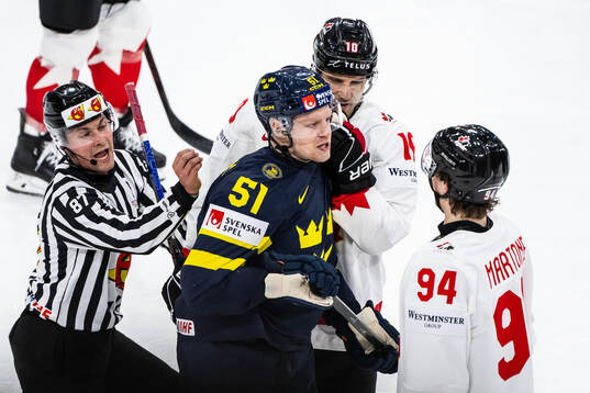 Emil Heineman of Sweden and Porter Martone of Canada