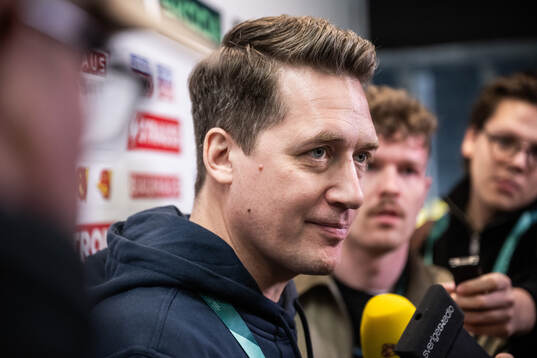 coach Sam Hallam of Sweden in the mixed zone ahead of a practice session