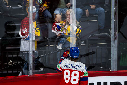 David Pastrnak of Czech Republic recognize his wife Rebecca Rohlsson and child Freya Ivy Pastrnak  ahead of the 2025 IIHF Ice Hockey World Championship quarterfinal game between Sweden and Czech Republic on May 22, 2025 in Stockholm. 