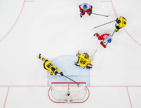 Rasmus Sandin with a save behind goalkeeper Jacob Markström of Sweden