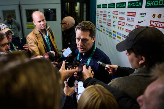 Head coach Sam Hallam of Sweden is being interviewed by media at a practice session
