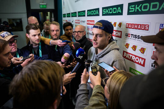 Leo Carlsson of Sweden is being interviewed by media at a practice session