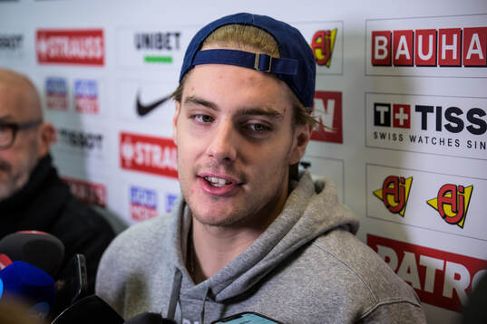 Leo Carlsson of Sweden is being interviewed by media at a practice session