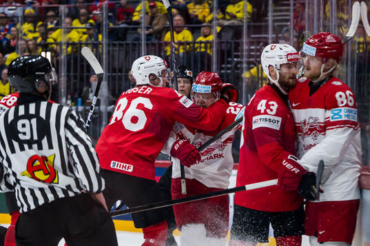 Janis Moser and Andrea Glauser of Switzerland against  Mikkel Aagaard and Joachim Blichfeld of Denmark