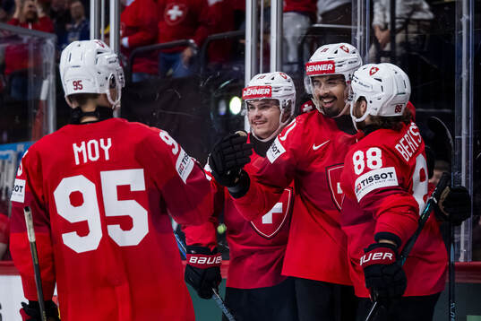 Jonas Siegenthaler of Switzerland celebrates after 6-0