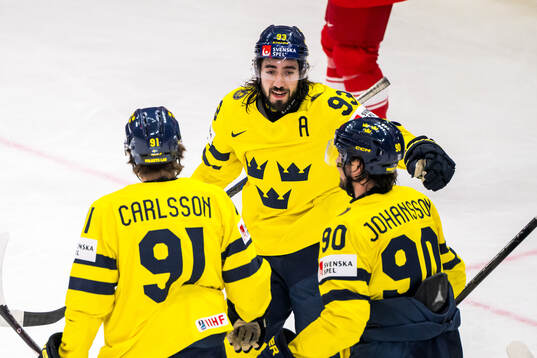 Leo Carlsson, Mika Zibanejad and Marcus Johansson of Sweden celebrate after 3-0