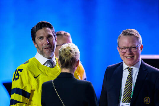 Henrik Lundqvist of Sweden, his wife Therese Andersson and Anders Larsson, IIHF Council member and president of the Swedish Ice Hockey Association, ahead of the IIHF Hall of Fame Ceremony on May 25, 2025 in Stockholm. 