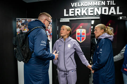 Media officer Henning Sverdrup, Frida Maanum and Guro Bergsvand of Norway