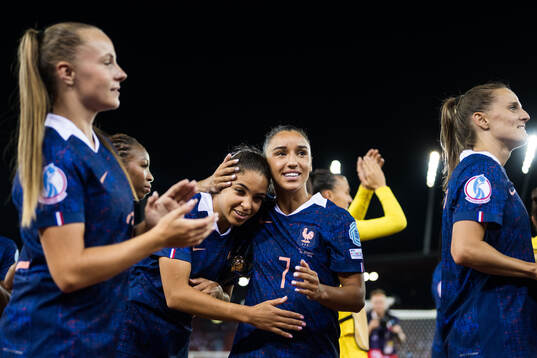 Sakina Karchaoui and Delphine Cascarino of France celebrates