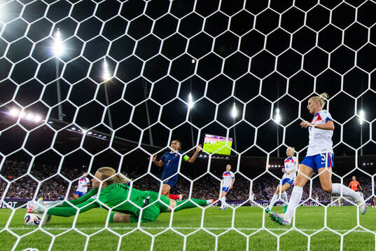 Goalkeeper Hannah Hampton and Alex Greenwood of England