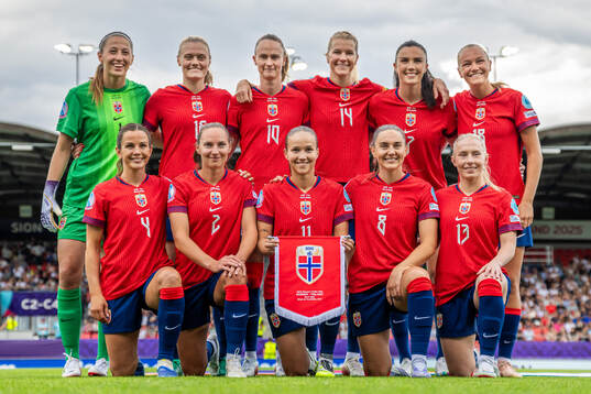 The starting eleven of Norway pose for a team photo