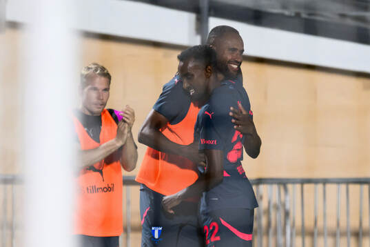 Isaac Kiese Thelin and Taha Ali celebrate