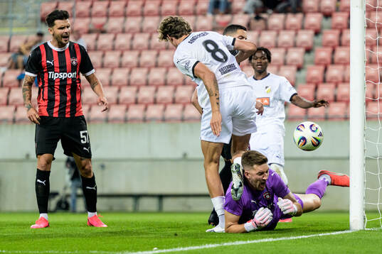 Silas Andersen of Häcken and goalkeeper Ziga Frelih of