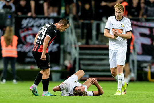 Sigge Jansson and Silas Andersen of Häcken against Martin