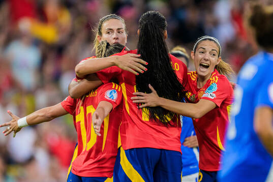 Players of Spain celebrates