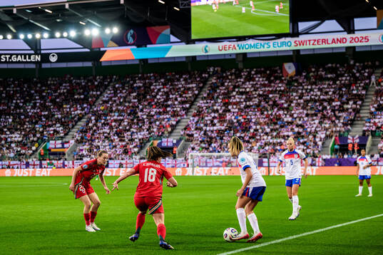 Carrie Jones and Esther Morgan of Wales and Lauren Hemp and