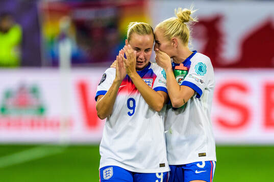 Beth Mead and Alex Greenwood of England