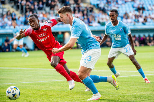 Lasse Berg Johnsen of Malmö FF and Armel Zohouri of FC