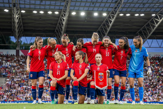 The starting eleven of Norway prepare for a team photo