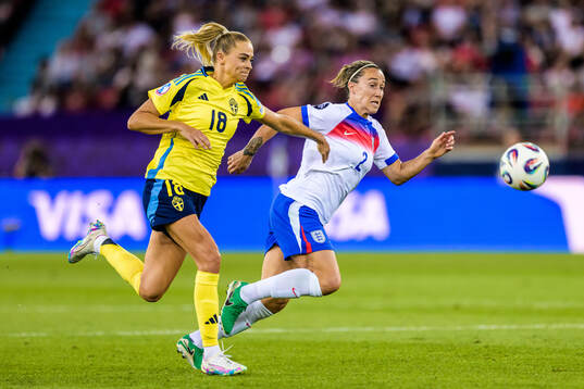 Fridolina Rolfö of Sweden and Lucy Bronze of England