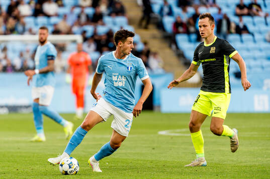 Lasse Berg Johnsen of Malmö FF and Janis Ikaunieks of FK