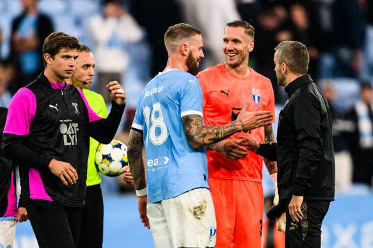 Pontus Jansson and goalkeeper Robin Olsen of Malmö FF