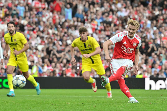 Martin Ødegaard of Arsenal scores his sides second goal