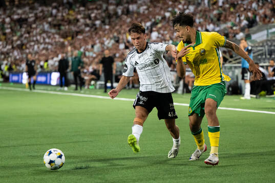 Jesper Reitan-Sunde of Rosenborg and Sebastian Tounekti of