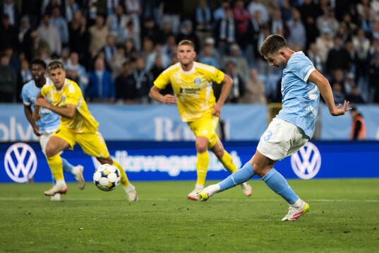 Lasse Berg Johnsen of Malmö FF scores 3-0