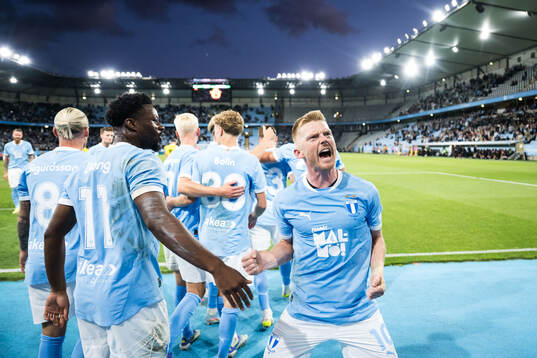 Anders Christiansen celebrates