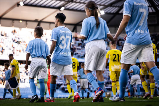 Adrian Skogmar of Malmö FF enter the pitch