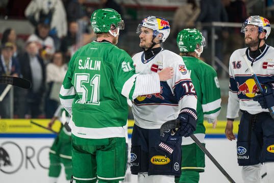 Rögles Calle Själin och Münchens Brady Ferguson