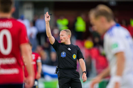 Domare Fredrik Klitte