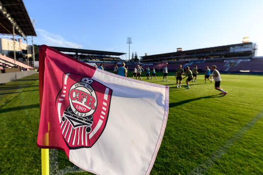 A flag with the CFR Cluj logo