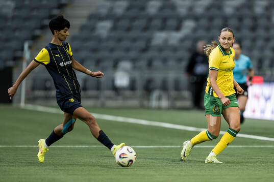Kristina Aleksanyan of Metalist 1925 and Vilde Hasund of