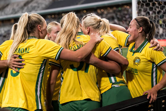 Cathinka Tandberg  of Hammarby celebrates with teammates