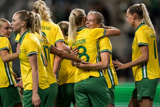 Julie Blakstad and Alice Carlsson of Hammarby celebrate