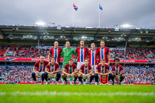 The starting eleven of Norway pose for a team photo