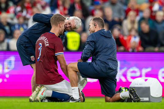 Kristoffer Ajer, doctor Ola Sand and manual therapist