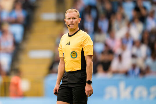 Domare Fredrik Klitte