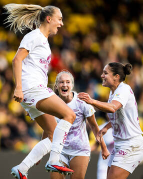Lauren Alison Davidson of Brann celebrates