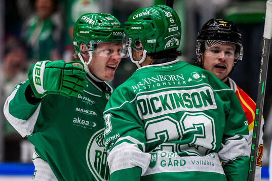 Rögles Fredrik Olofsson och Josh Dickinson jublar