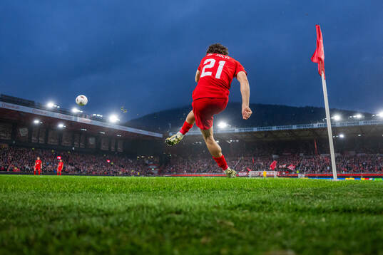 Denzel De Roeve of Brann takes a corner kick