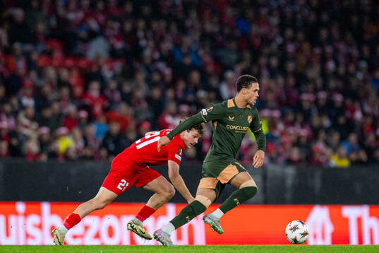 Denzel De Roeve of Brann and Adrian Blake of Utrecht