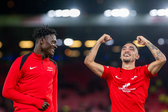 Nana Kwame Boakye and Niklas Castro of Brann celebrate