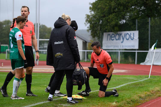 En linjedomare får vård