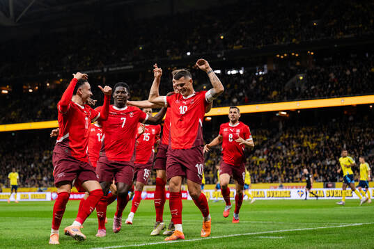 Ruben Vargas, Breel Embolo, and Granit Xhaka of Switzerland